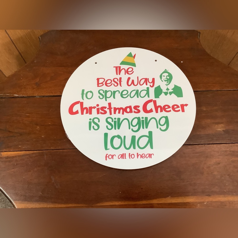 The movie Elf Buddy’s Festive singing loud for all to hear Christmas Cheer Sign